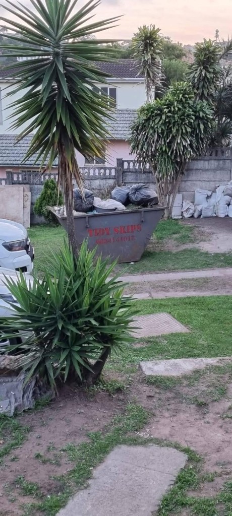Tidy Skips 2m³ skip loaded with garden refuse